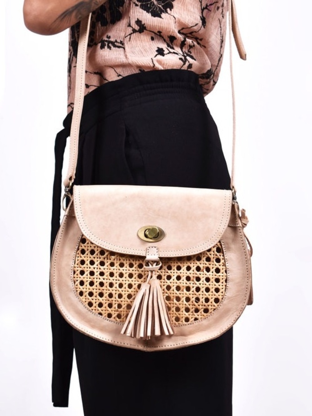 Natural/pink beige rattan saddle bag handmade in Indonesia